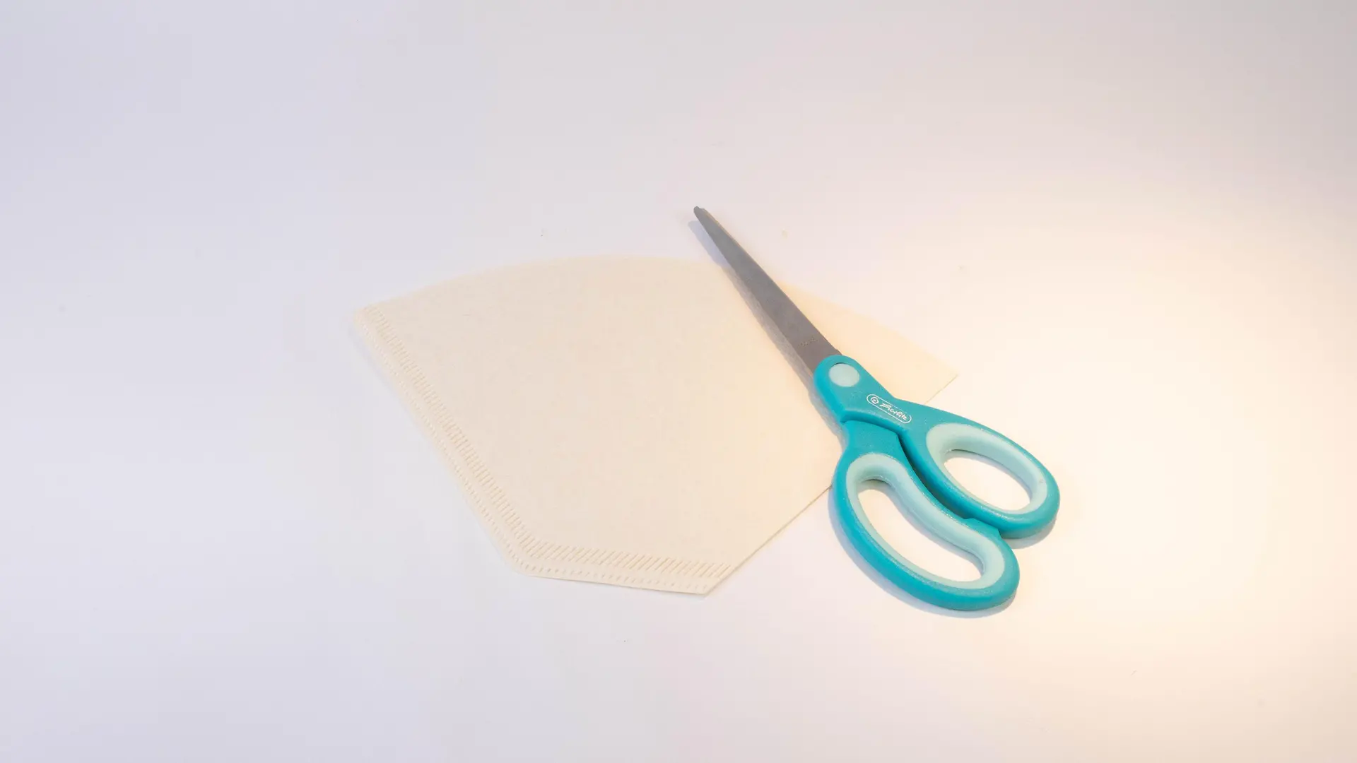 scissor and paper coffee filter